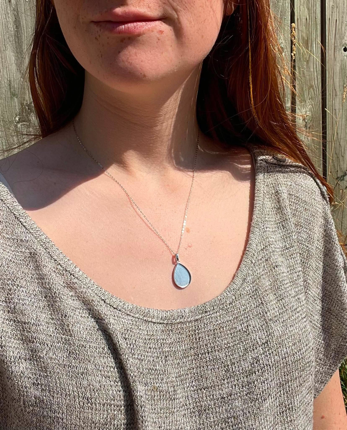 Necklace Drop By Drop  A Drop In Time Keepsakes woman wearing necklace to show relative size.